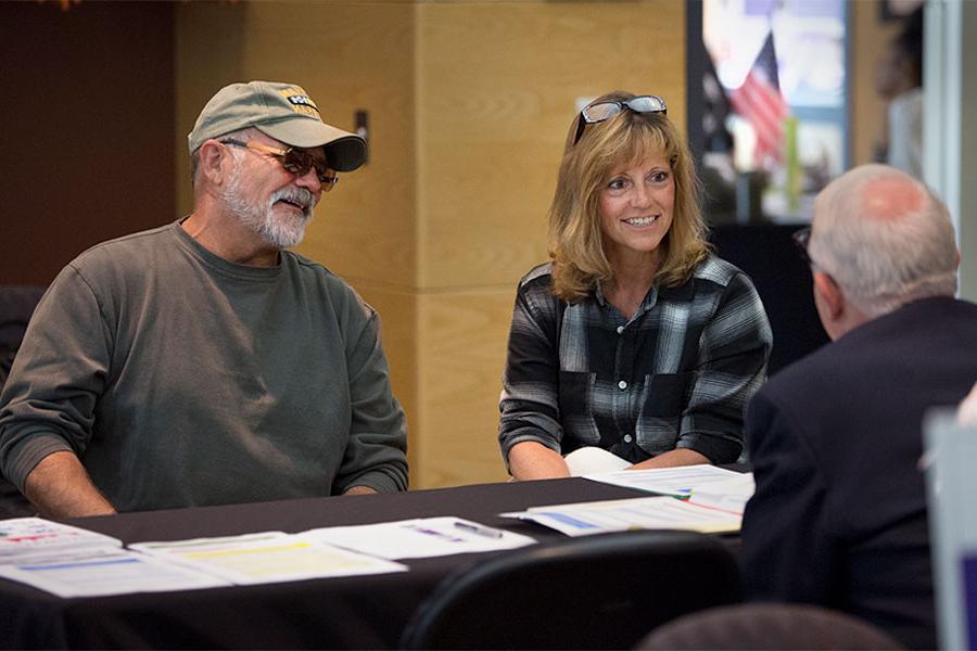  A discussion at a Veteran & Family Members Education Fair in the Old Main Ballroom of the University Center.